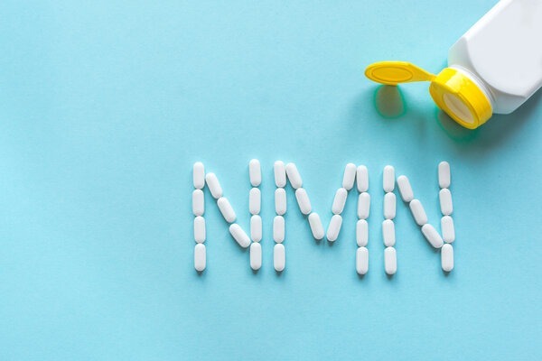 Nicotinamide,Mononucleotide,,Niacin,,Anti,Adeing,Vitamin.,White,Pills,Forming,Shape